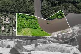 Irreplaceable Titled Beachfront Parcel with 35 Water Letters: 27,040 m2 of Prime Coastal Real Estate!