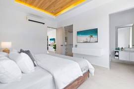 Villa Tropical Dawn: 4-Bedroom Modern Oasis in Bosques de Pinilla with Forest Views & Resort-Style Amenities