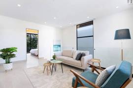 Villa Tropical Dawn: 4-Bedroom Modern Oasis in Bosques de Pinilla with Forest Views & Resort-Style Amenities