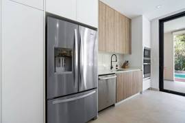 Villa Tropical Dawn: 4-Bedroom Modern Oasis in Bosques de Pinilla with Forest Views & Resort-Style Amenities