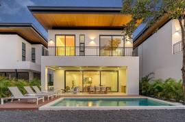 Villa Tropical Dawn: 4-Bedroom Modern Oasis in Bosques de Pinilla with Forest Views & Resort-Style Amenities