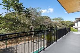 Villa Tropical Dawn: 4-Bedroom Modern Oasis in Bosques de Pinilla with Forest Views & Resort-Style Amenities