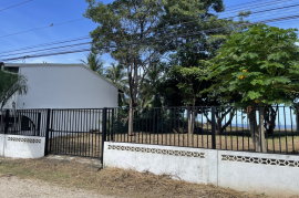 Surfside Lot Y22: One of the Only Remaining BEACHFRONT Lots in Playa Potrero with Water!!