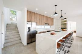 The Enclave: Ultra-Modern 5 Bedroom Villa Located Minutes From the Beach!