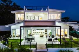 The Enclave: Ultra-Modern 5 Bedroom Villa Located Minutes From the Beach!