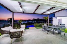 The Enclave: Ultra-Modern 5 Bedroom Villa Located Minutes From the Beach!